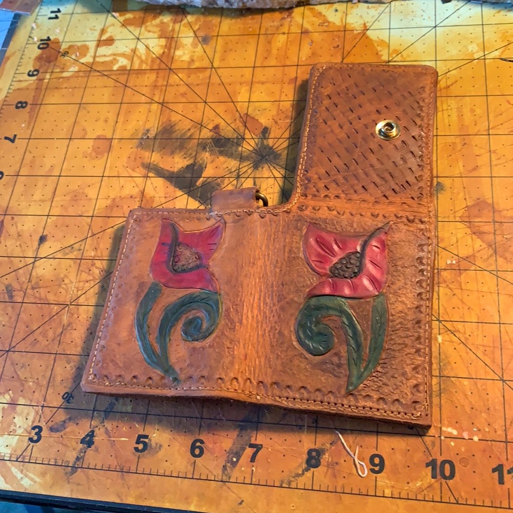 Hand crafted hand tooled trifold wallet